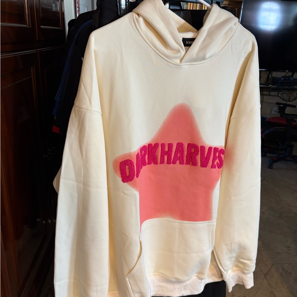 Darkharvest Cream Hoodie with Pink Star Design